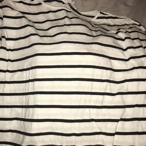 white & black striped shirt .